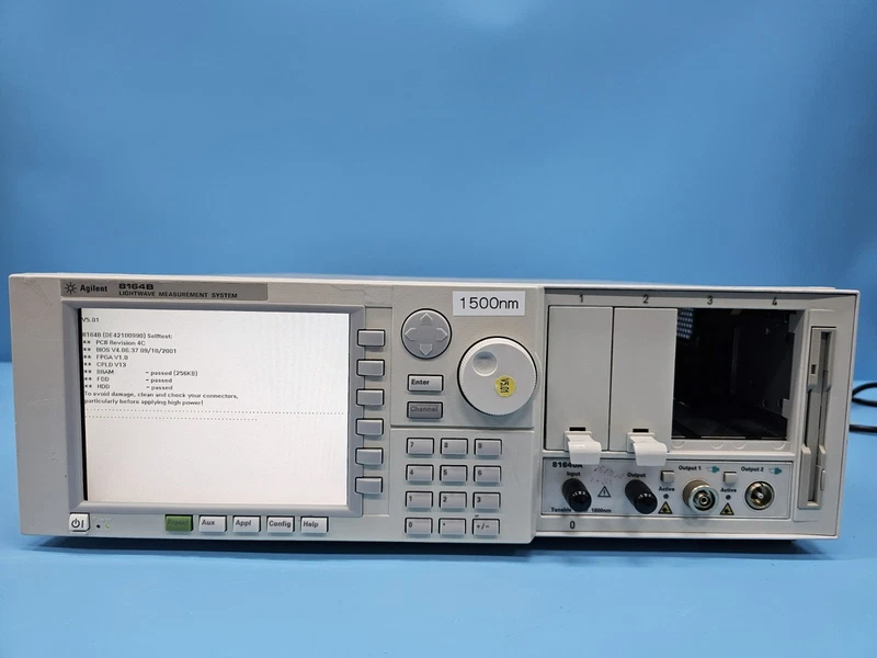 AGILENT 8164B Measurement Mainframe , 81640A #072 Tunable Laser Source Module 1 s l800 16
